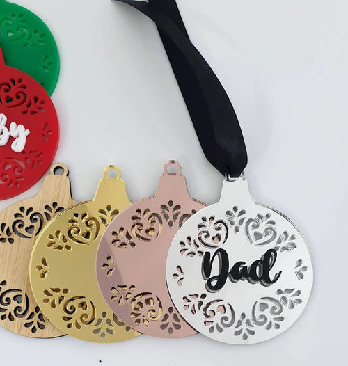 Gold, rose gold and white filigree baubles with 3D black name Dad on black ribbon