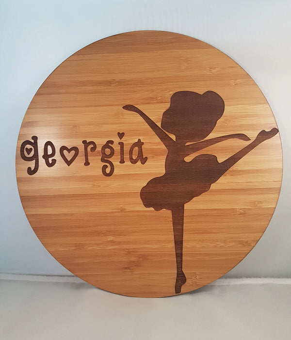 Round bamboo name plaque reading Georgia with an engraved ballerina
