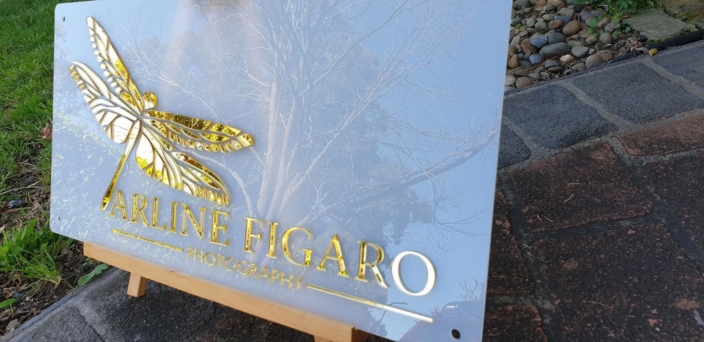 Frosted acrylic Arline Figaro Photography sign with gold mirror dragonfly and lettering