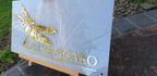 Frosted acrylic Arline Figaro Photography sign with gold mirror dragonfly and lettering