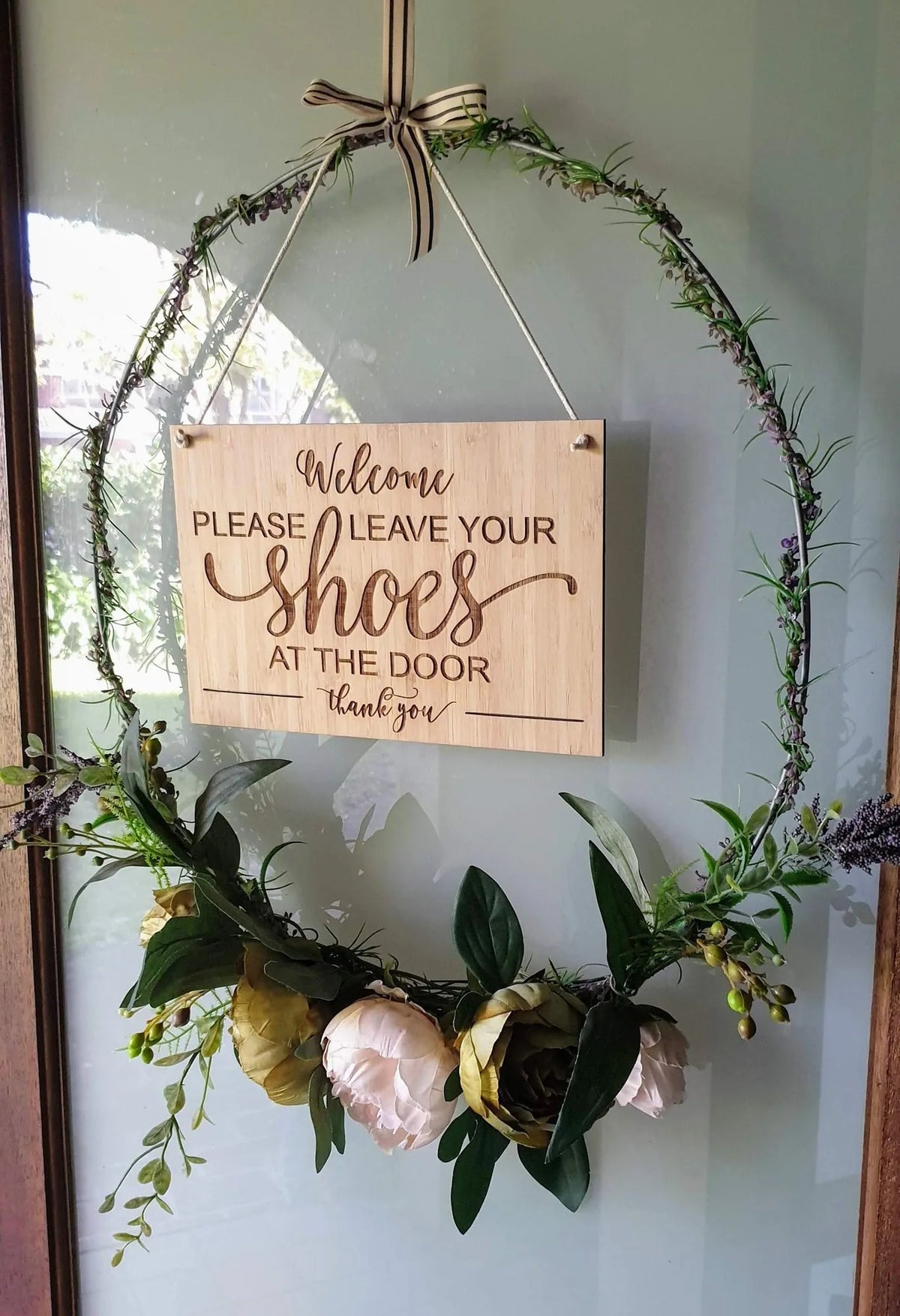 Timber Please leave your shoes at the door sign hanging from a floral wreath